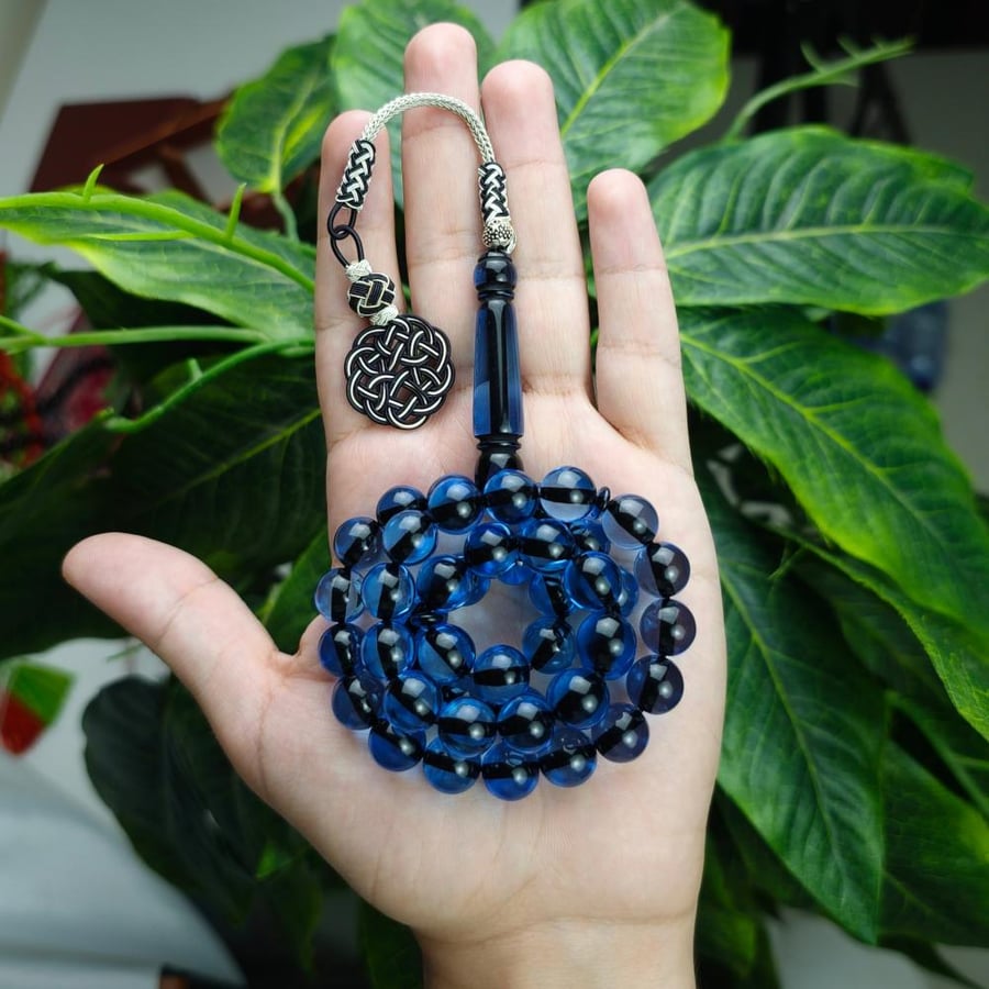 Black and transparent agate prayer bead, royal, with a brass tassel