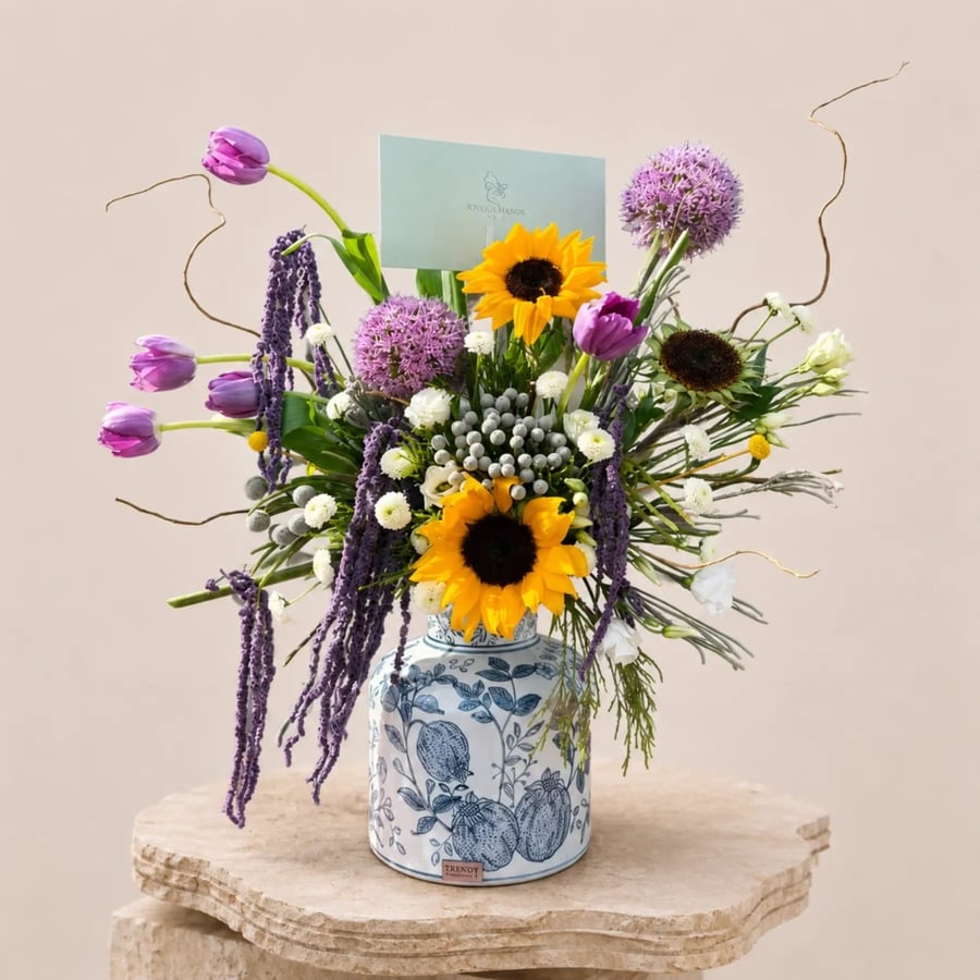 Luxury natural flower vase with Alium and sunflower, a Hajj gift, in Dutch arrangement