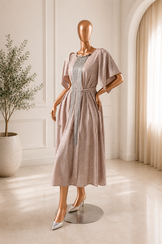 A pink dress with silver embellishments