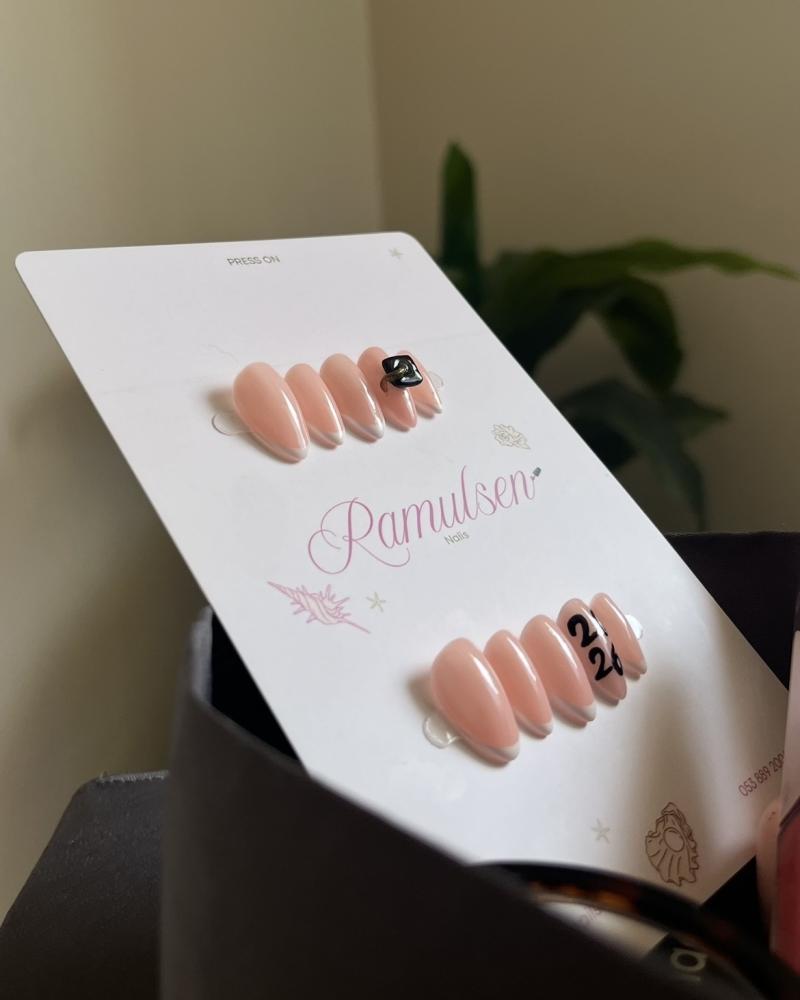 Graduation cap nails
