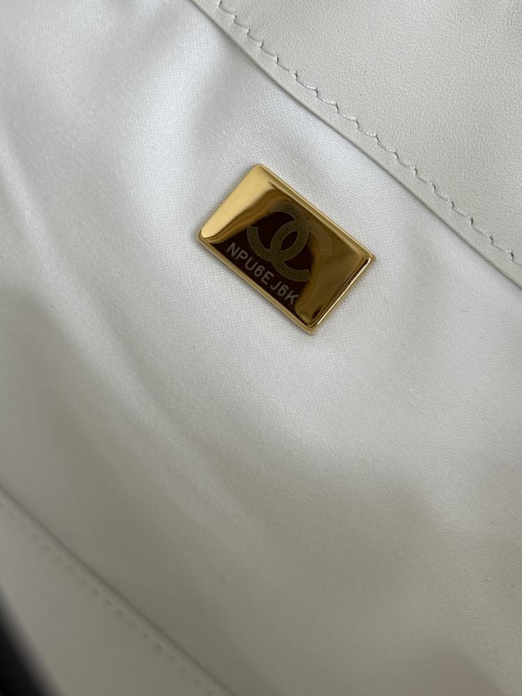 Chanel Quilted Drawstring Tote Bag