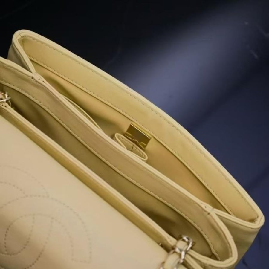 Chanel Quilted Top Handle Flap Bag with Metal Plate