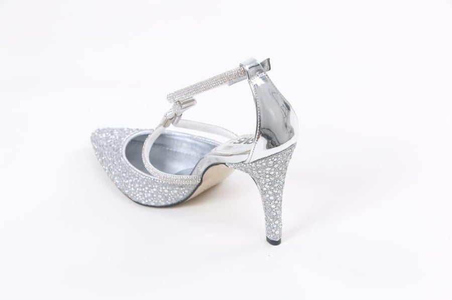 Women's shoe encrusted with crystal and pearl stone