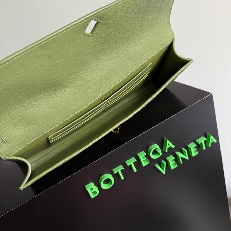 Andiamo Clutch in Ostrich Leather