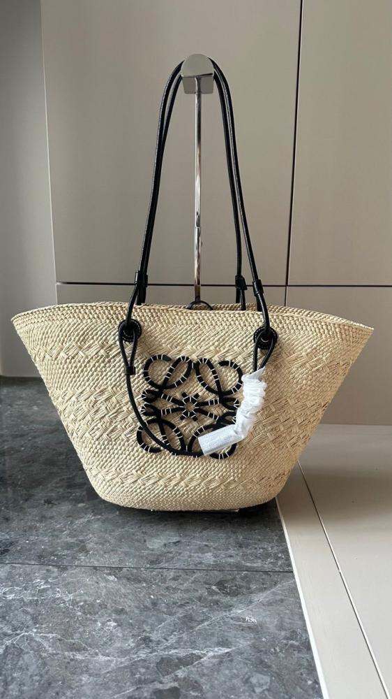 Medium Anagram Basket bag in iraca palm and calfskin
