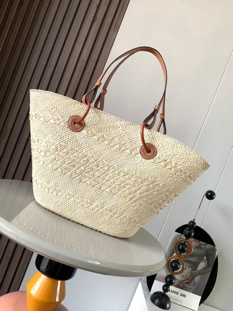 Medium Anagram Basket bag in iraca palm and calfskin