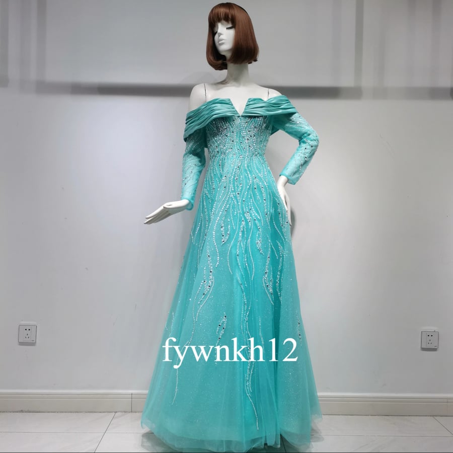 فستان سهرة تول أخضر