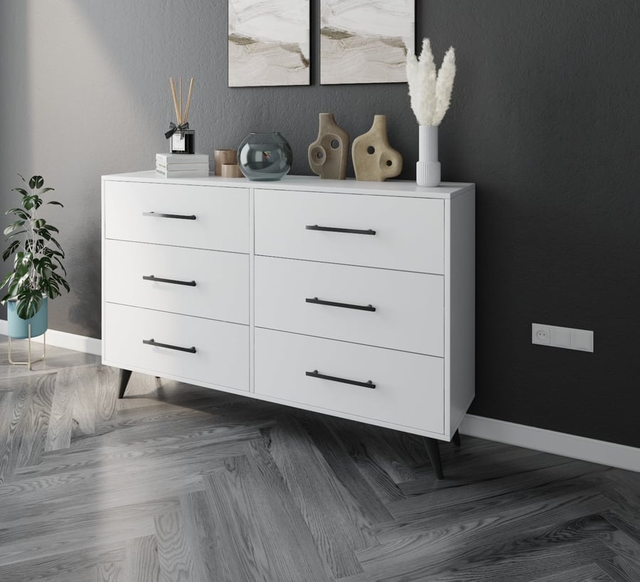 A white-colored console unit with drawers
