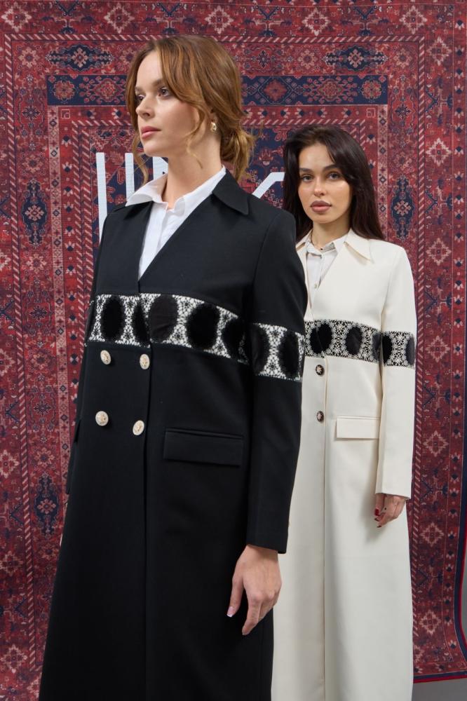 Black blazer and off-white with Juber Turkish inserts on the chest, padded