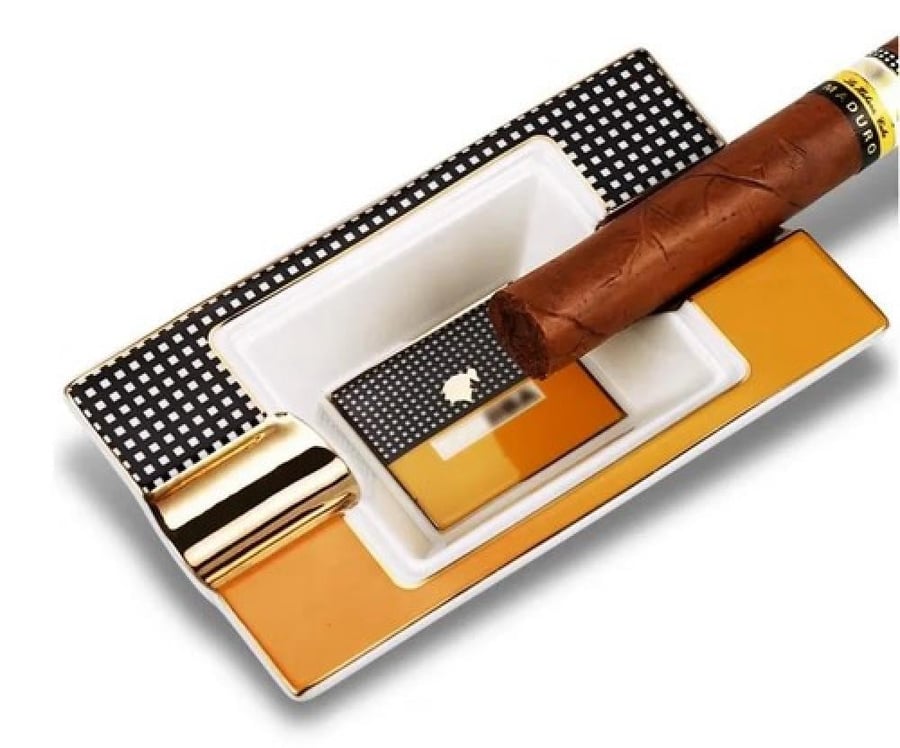 Ceramic cigar lighter with a unique design. Distinctive home decor