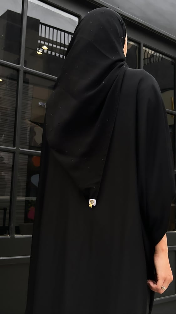 Half black bisht
