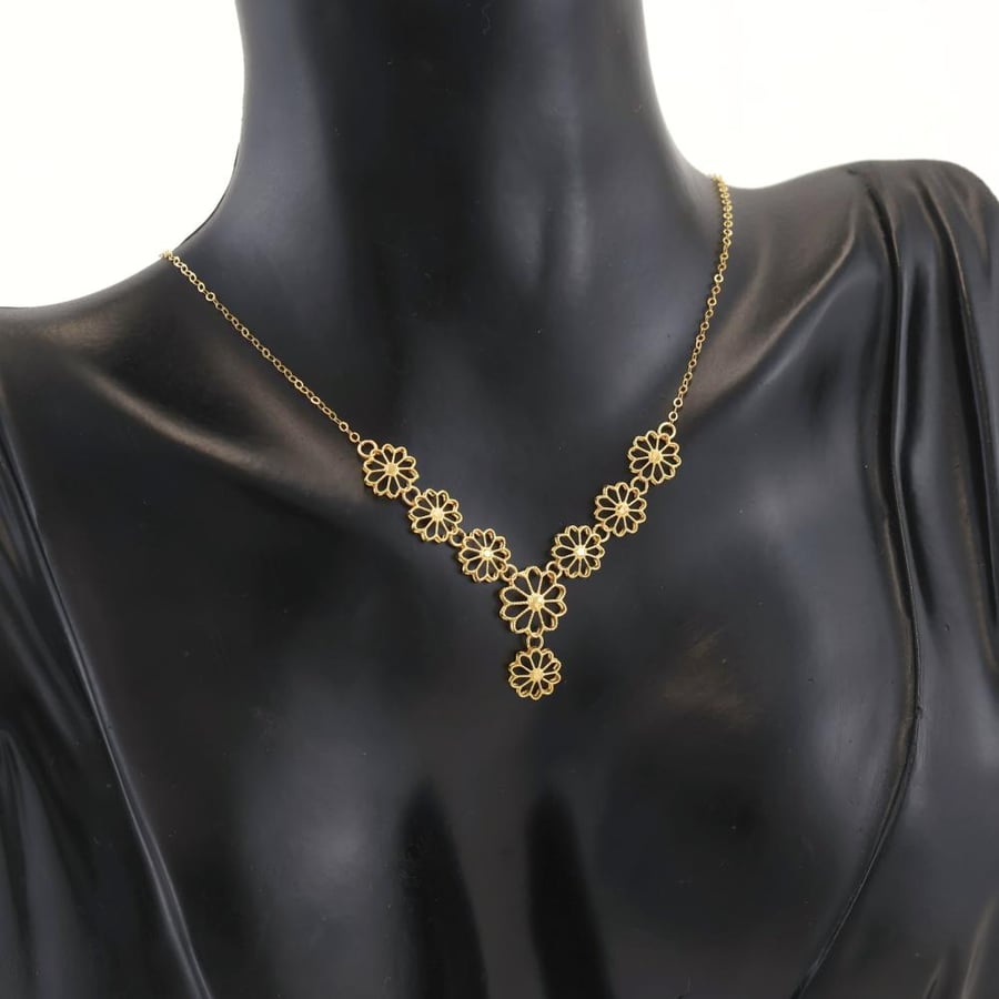 طقم ذهب ازهار ذهب صافي - عيار 21