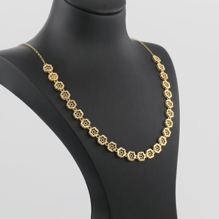 طقم ذهب  ازهار  جميلة -  عيار 21