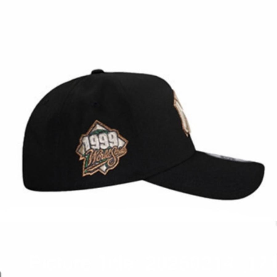 New Era cap, black fabric with beige embroidery