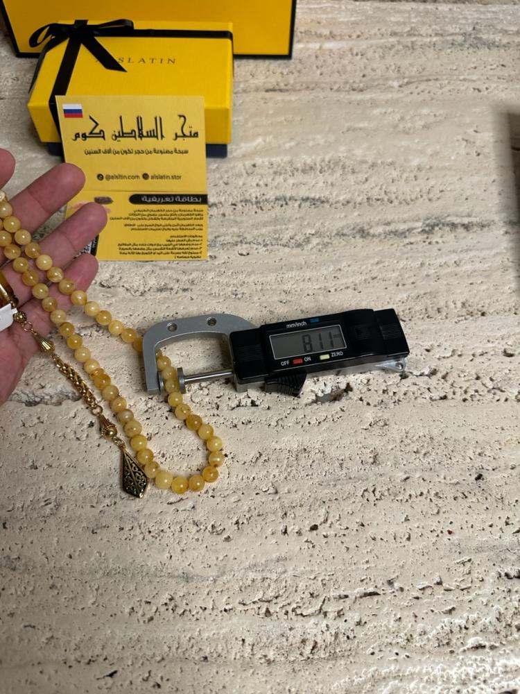 سبحه كهرمان حر شوائب طبيعية مع شكة استنلس استيل نفس الاستيل المستخدم في الساعات الفاخرة