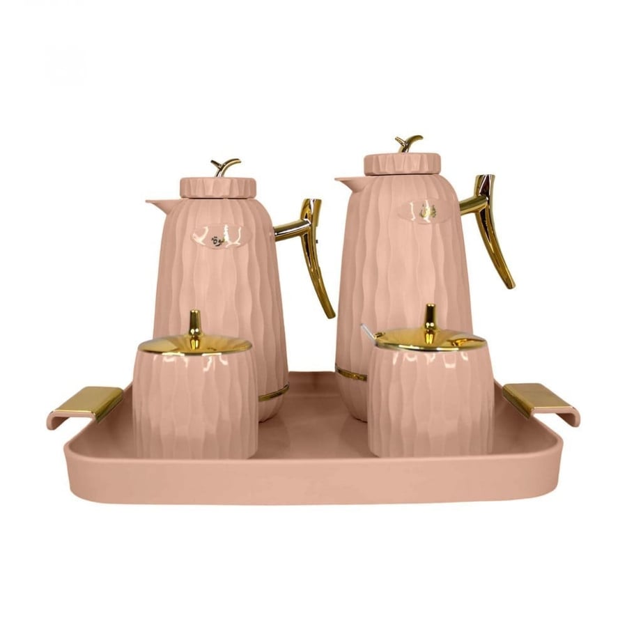A set of teapots with a tray and 2 sugar bowls.