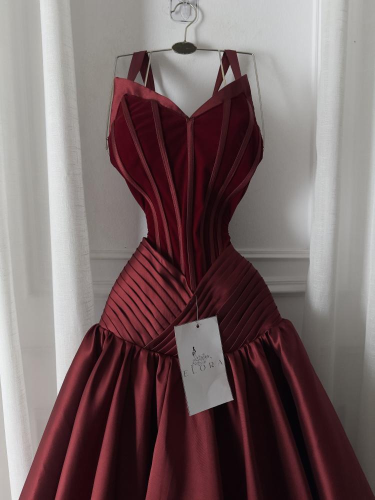 A rose-colored dress made of mikado on velvet flare