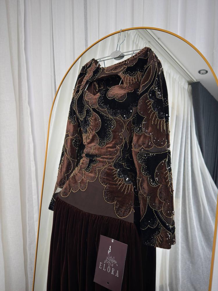 A brown dress with elegant velvet