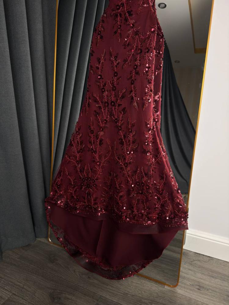 A purple evening dress with embroidery