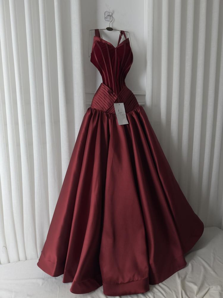 A rose-colored dress made of mikado on velvet flare