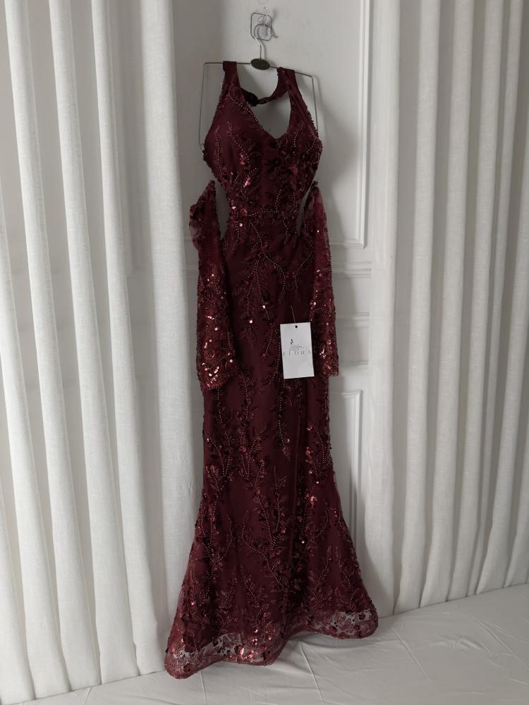 A maroon evening dress with elegant embroidery