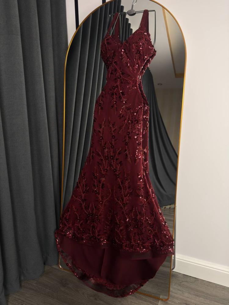 A purple evening dress with embroidery