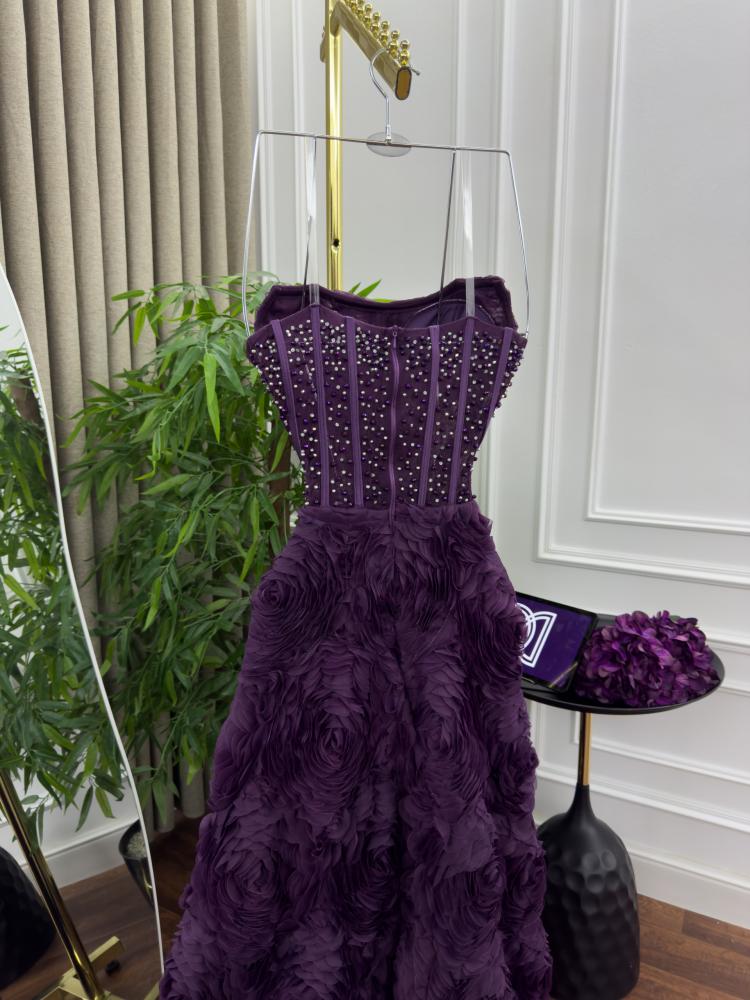 Purple dress, available