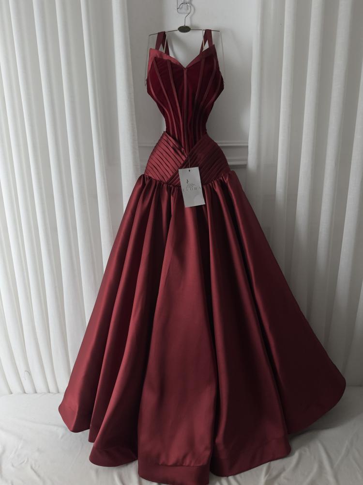 A rose-colored dress made of mikado on velvet flare