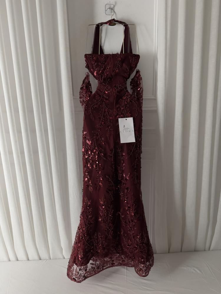 A maroon evening dress with elegant embroidery