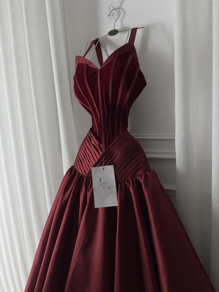 A rose-colored dress made of mikado on velvet flare