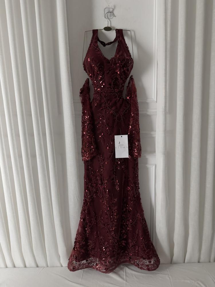 A maroon evening dress with elegant embroidery