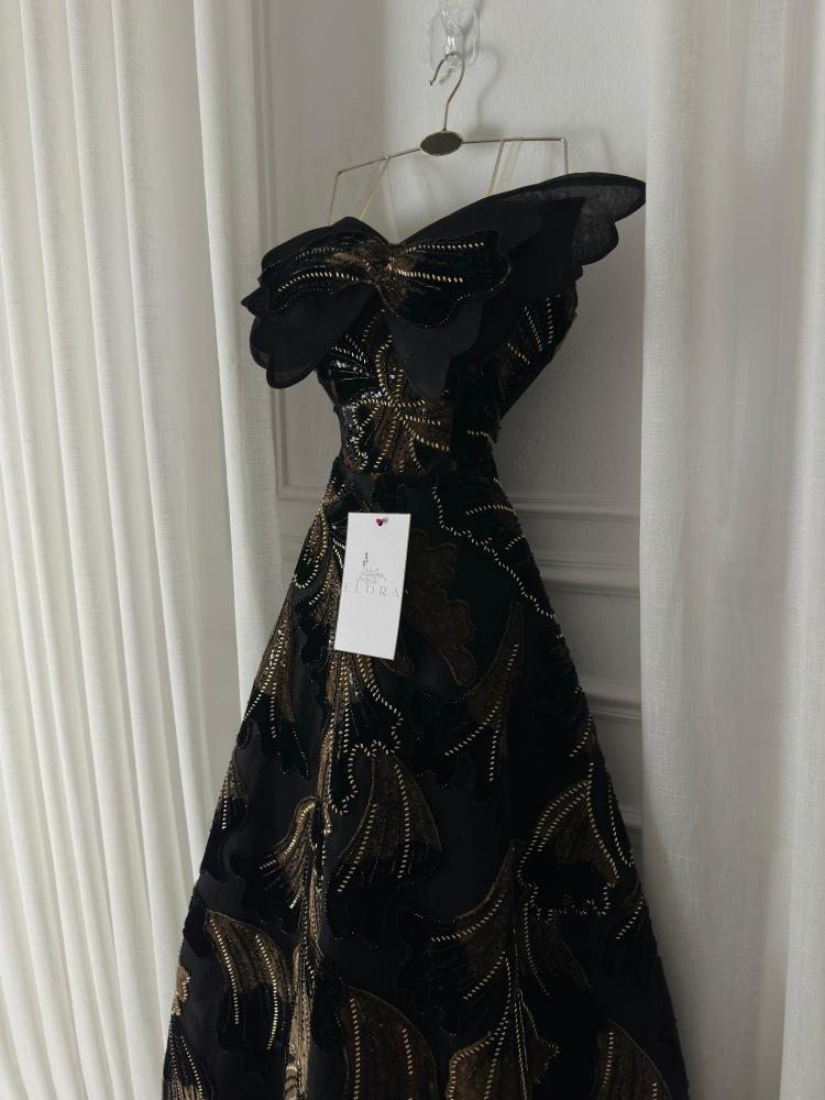 Elegant evening dress with a bedspread-style bodice
