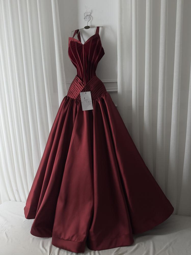 A rose-colored dress made of mikado on velvet flare