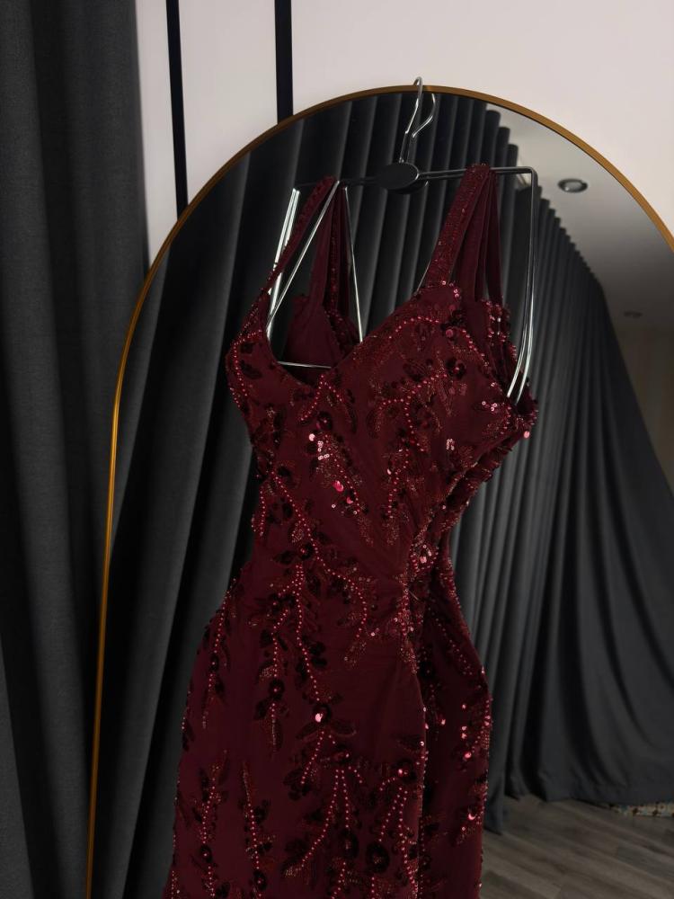 A purple evening dress with embroidery