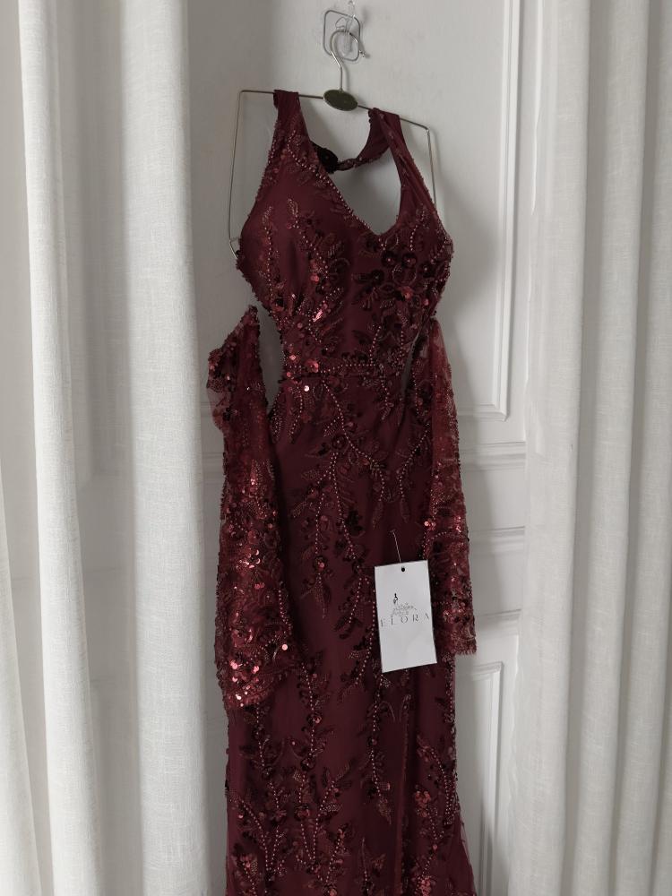 A maroon evening dress with elegant embroidery