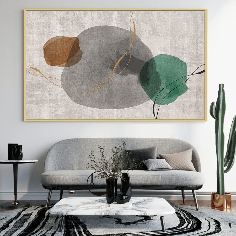 A piece of art with a design of abstract circles and distinctive olive and coral colors