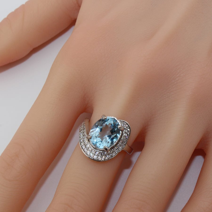 Natural topaz ring auction