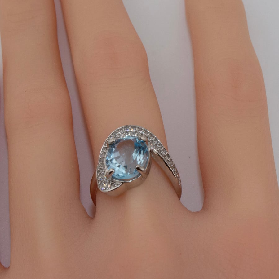 Natural topaz ring auction