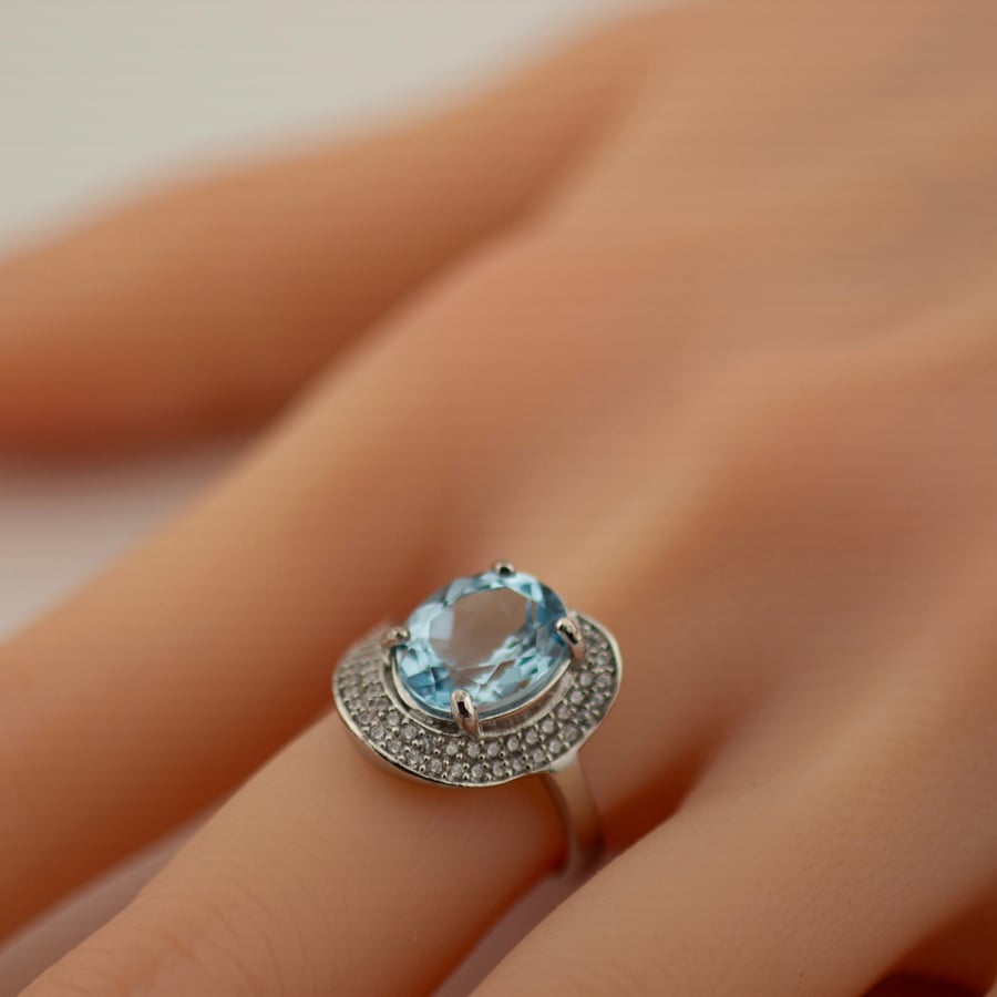Natural topaz ring auction