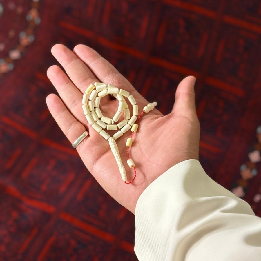 مسباح عظم جمل لون ابيض تمليكه