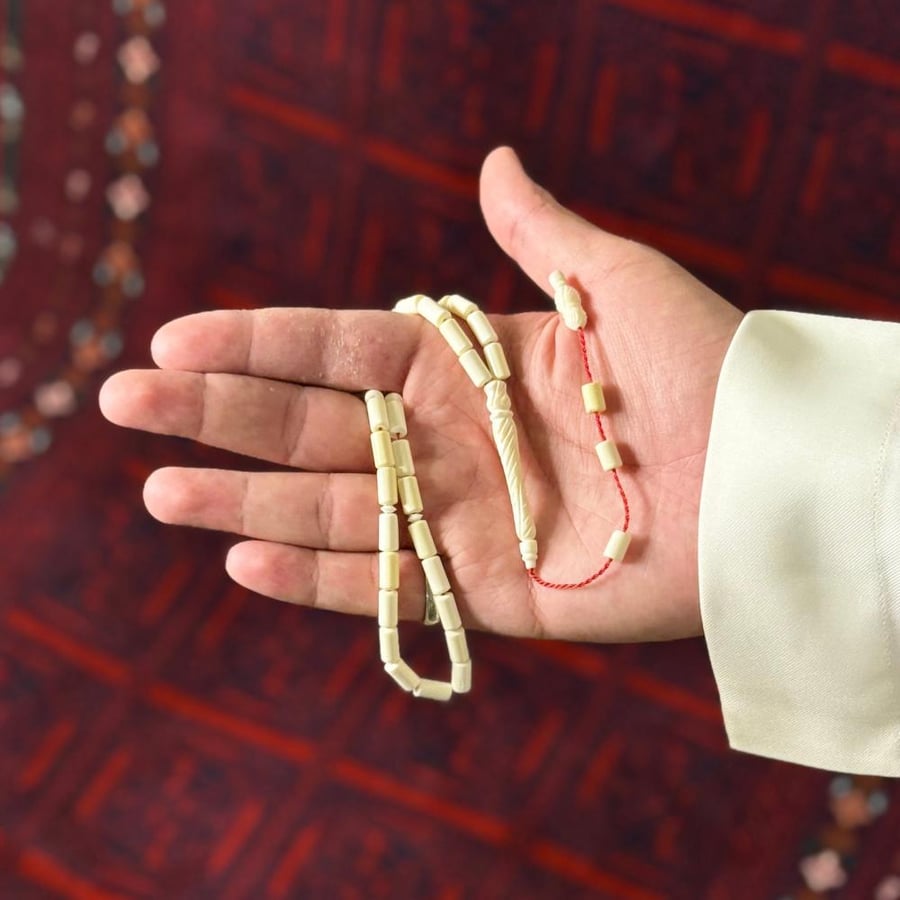 مسباح عظم جمل لون ابيض تمليكه