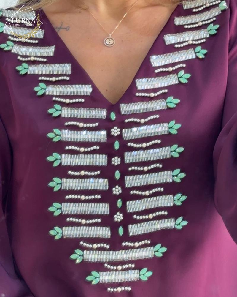 Handmade dress decorated with the luxury of crystal