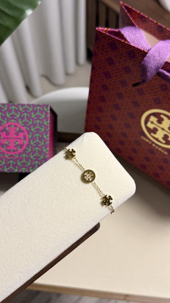 إسوارة TORY BURCH معدن ذهبي بفصوص