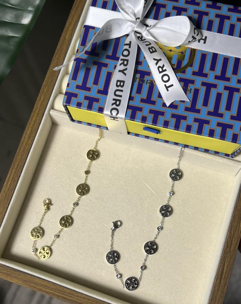 إسوارة TORY BURCH معدن ذهبي بفصوص
