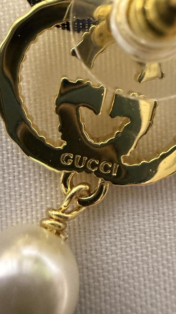 حلق GUCCI - معدن ذهبي بكرستالات