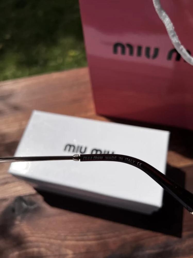نظارة miu miu إطار ذهبي - عدسة بني مدرج