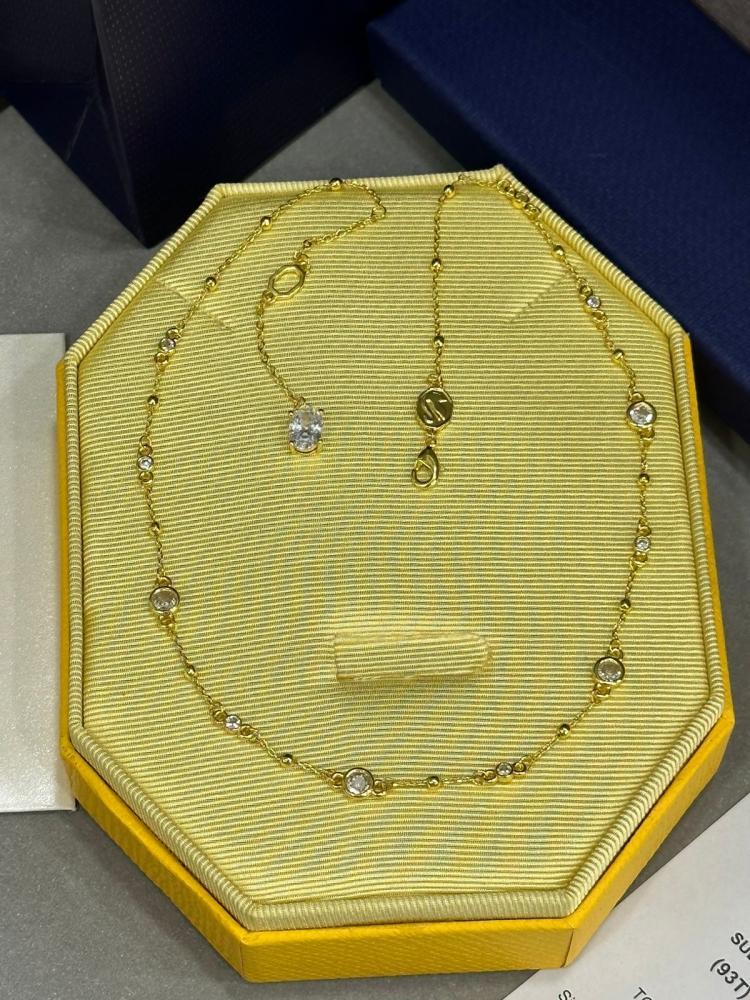 سلسال SWAROVSKI سلسال SWAROVSKI سلسال سوارفيسكي اصفر بكرستالة صفراء
