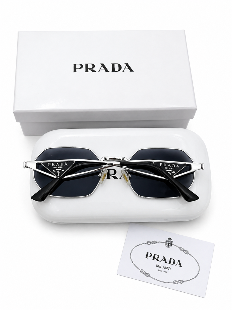 نظارة PRADA - نظارة شمسية لونين( بني اطار ذهبي - اسود اطار فضي )