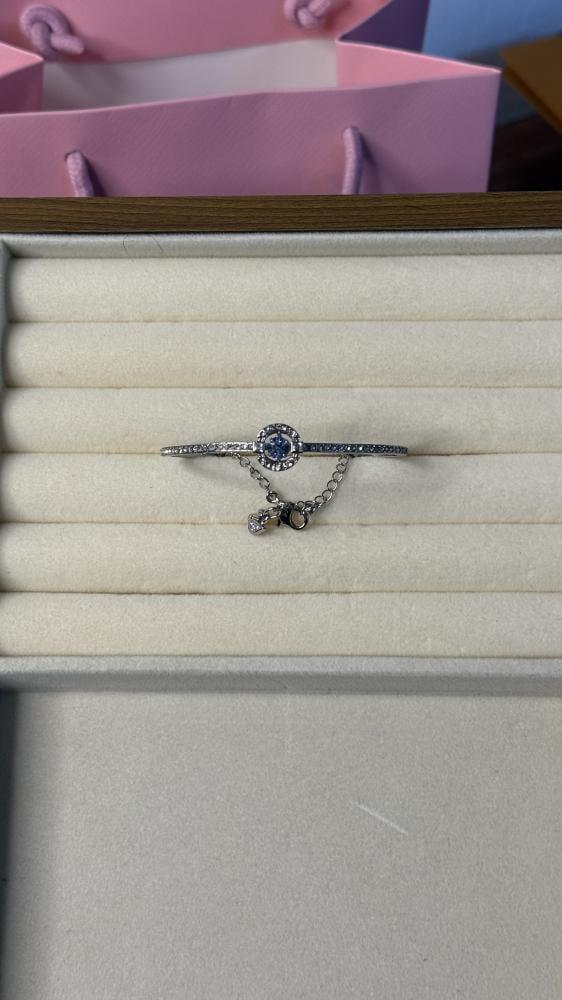 إسوارة SWAROVSKI - اسوارة سوارفيسكي فضي كرستالة زرقاء
