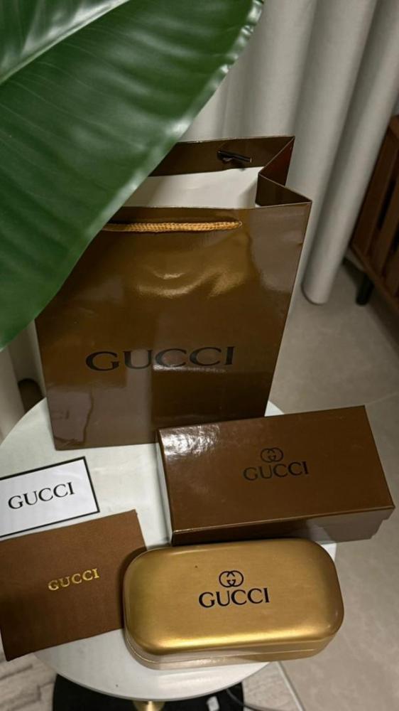 نظارة gucci - إطار ذهبي